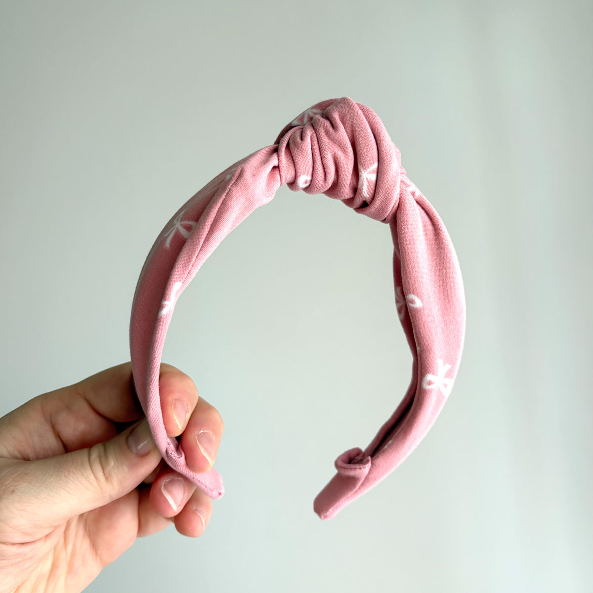 LIMITED EDITION KNOTTED HEADBAND - PINK WITH WHITE BOWS
