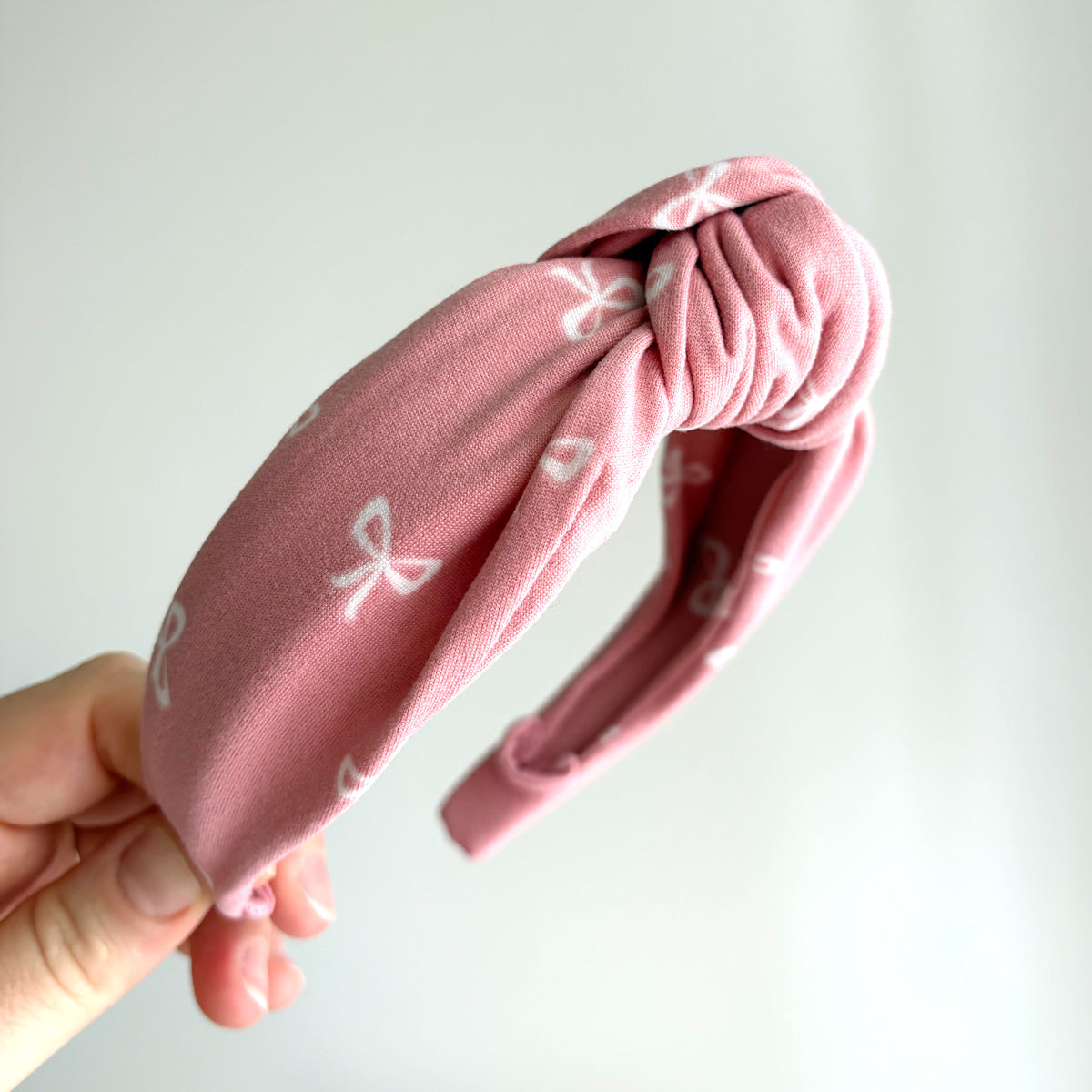 LIMITED EDITION KNOTTED HEADBAND - PINK WITH WHITE BOWS