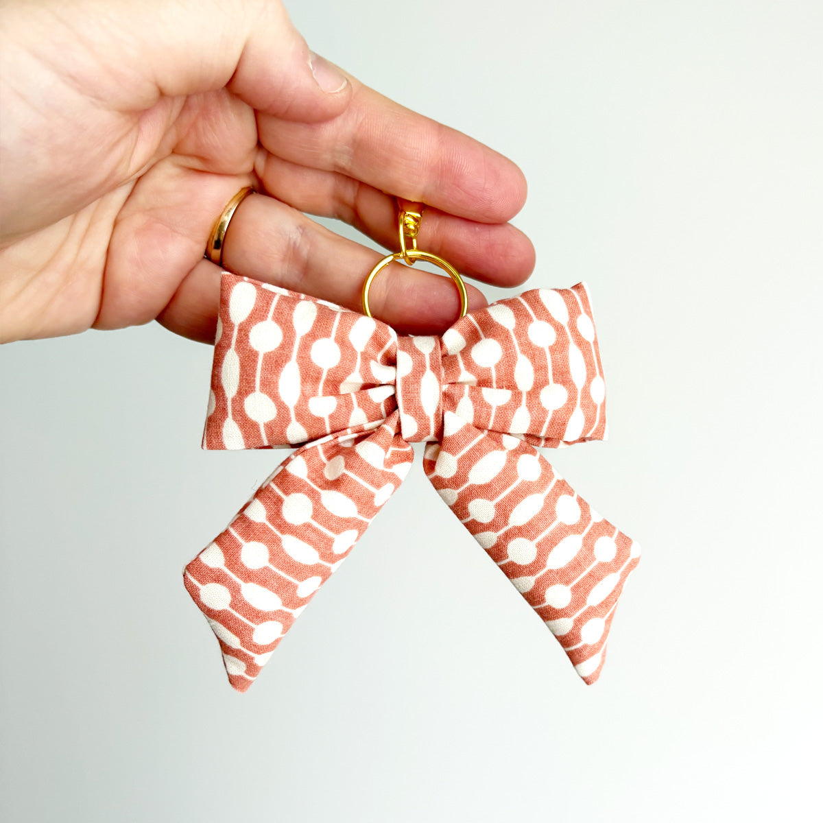 PUFFY BOW KEYCHAIN - ABSTRACT RED
