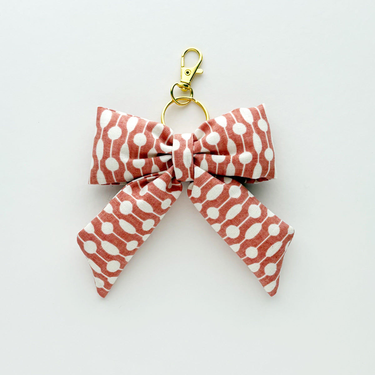 PUFFY BOW KEYCHAIN - ABSTRACT RED